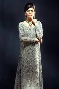 Light fawn full-length back trail maxi for Walima / Reception brides. Maxi features stunning embellishments all over the front. Embellished border implemented on the back hemline. This dress comes with a matching dupatta.