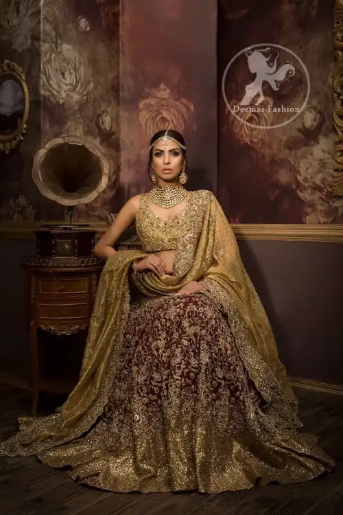 The blouse features marvellous and awesome embellishments accent all over the front and back. Concealed hooks closure front. Dusty gold