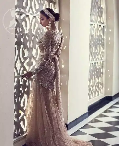 The shirt features beautiful and lovely embellishment all over the bodice, front flared, and applique work border on the hemline.