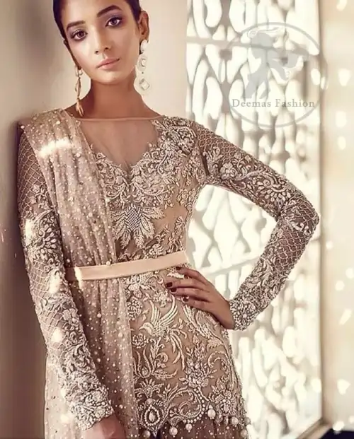 The shirt features beautiful and lovely embellishment all over the bodice, front flared, and applique work border on the hemline.