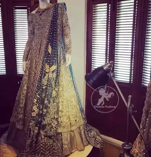 Silver Gray Bridal Frock. The frock features marvellous and awesome embellishments accenting all over the front and back Full-length sheer