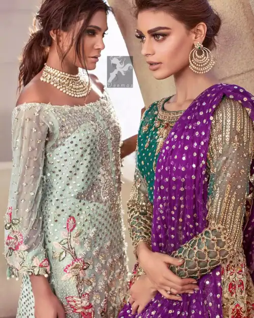 Sweetheart neckline pure crinkle chiffon shirt adorned with embellishment. Embellishment includes majorly light golden, silver, shocking pink and mehndi green