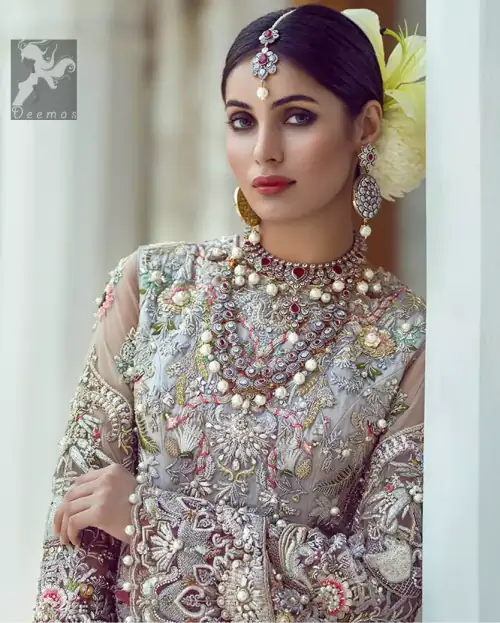 Ivory white long fitted bridal maxi. Maxi adorned with colorful embellishment using appliques and threads. Bridal maxi comes with two