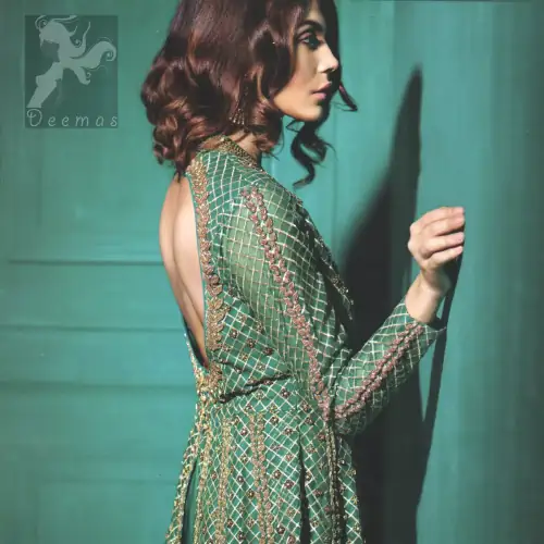 Party wear teal green peplum made with organza. Peplum having beautiful gold and antique hand embellishment. Peplum comes silky tulip