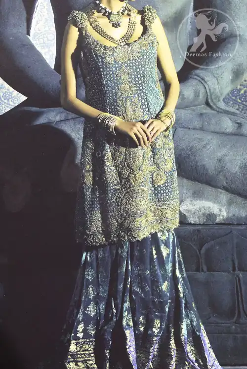 Bluish Slate Gray velvet shirt has been adorned with antique shades of embellishment.Embellished 3d motifs has been applied on shoulders.