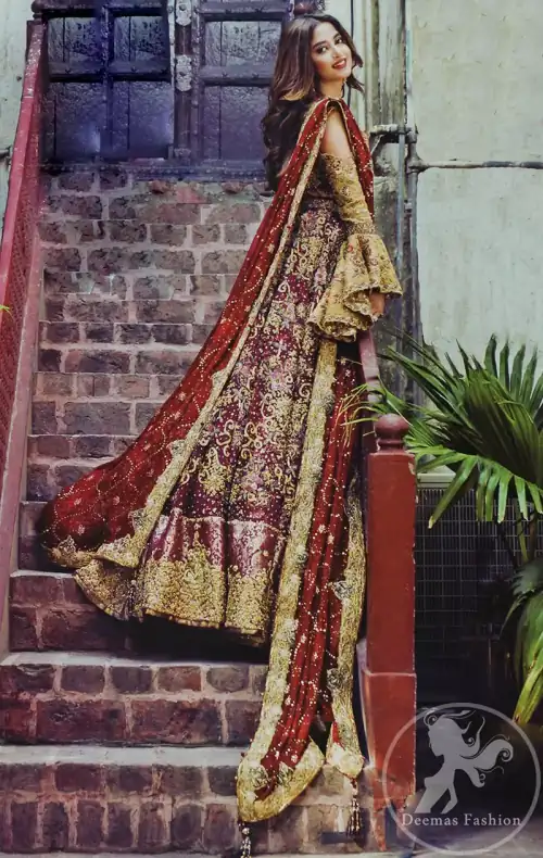 Alpine Blouse is of pure tissue. Top has cold shoulders design also having umbrella shaped sleeves. Blouse has been embellished