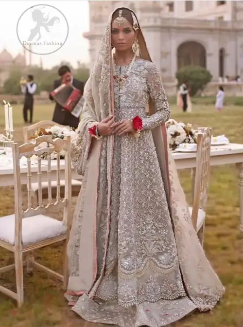 This outfit is a timeless beauty.It is heavily embellished with silver gold kora dabka, Sequins and swaronski crystals.This exquisite Pishwas