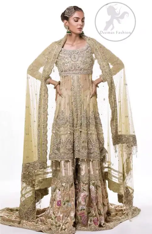 This dress is beautifully sculptured with floral embroidery. It is meticulously highlighted with antique shaded kora, dabka, tilla, sequins and