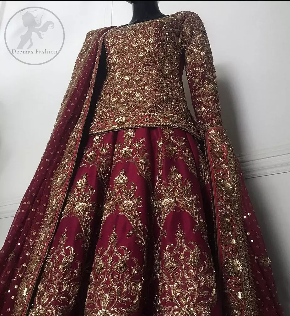 This outfit is meticulously highlighted with antique shaded kora dabka, tilla, sequins and swarovski. This dress is beautifully sculptured with floral embroidery. Shirt is fully embellished. It is artistically coordinated with embellished lehenga. Lehenga is enhanced with embroidered border and applique. It comes with chiffon dupatta, having four sided embellished border and sprinkled with sequins all over it.