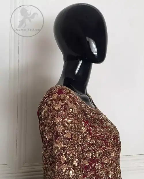 This outfit is meticulously highlighted with antique shaded kora dabka, tilla, sequins and swarovski. This dress is beautifully sculptured with