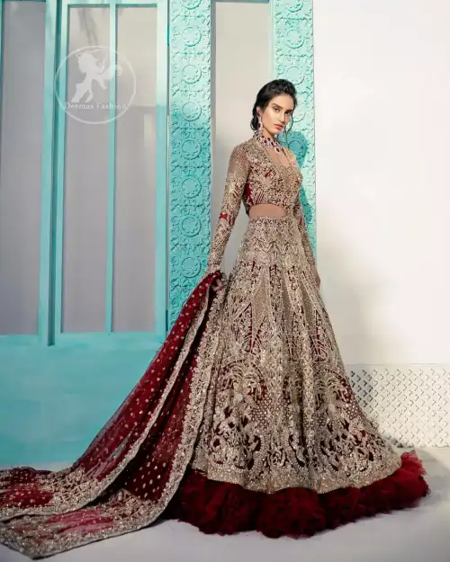 Heavy embellished bridal dress, with V Shaped blouse and skirt encrusted with swarovski stones, pearls, tilla and kora dabka along