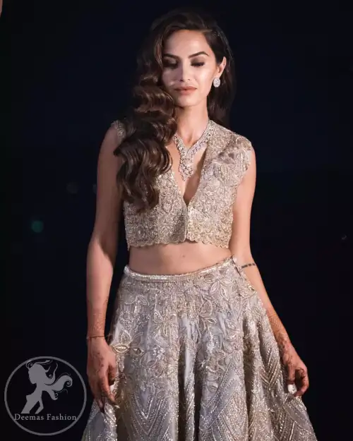 This bridal dress is perfect for your special day. Beautifully decorated with floral embroidery and embellished scalloped border. It is