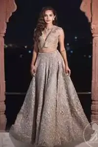 This bridal dress is perfect for your special day. Beautifully decorated with floral embroidery and embellished scalloped border. It is adorned with kora, dabka, tilla, sequins and pearls. It comes with an exquisite lehengha with thick embroidered border to give it a regal look. Dupatta comprises of floral thread embroidery allured with thick embellished border.