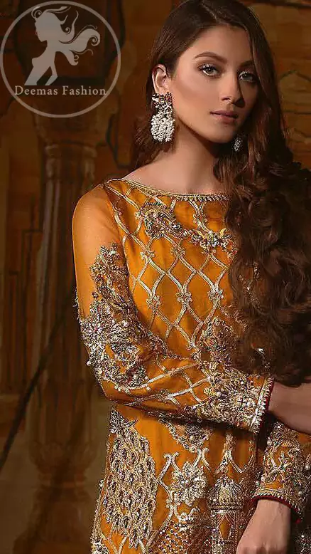 This exquisite shirt is fully decorated with floral and different motifs patterns all over it. This dress is beautifully decorated with heavy embroidery. It is highlighted with kora, dabka, tilla, sequins and pearls. Lehengha is fully embellished with tilla work. It is artistically coordinated with net dupatta which is embellished.