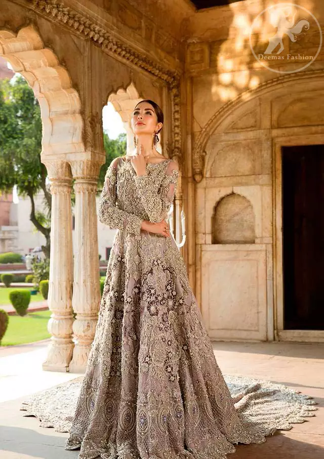 Redefine your style in this traditional and versatile ensemble ornamented with floral and geometric pattern embroidery furnished with kora, dabka, tilla, sequins, kundan, and pearls. It comes with brocade pajama. It is stunningly coordinated with Chiffon dupatta with embellished borders on all sides and sequins spray all over it.