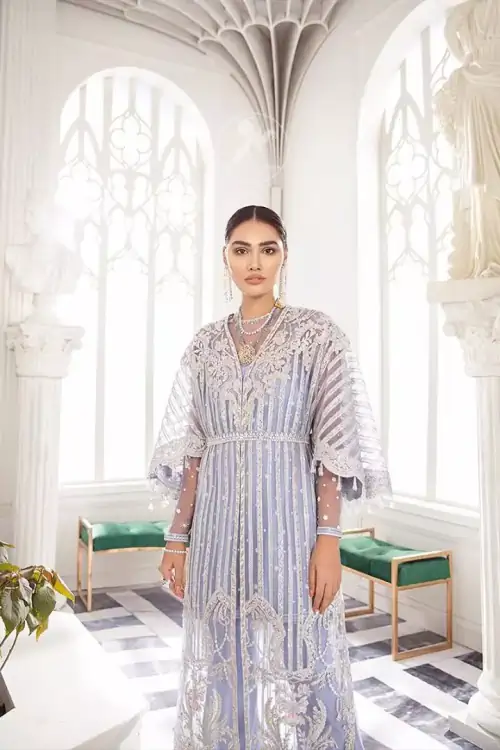 Steal the moment with our cold purple floor length gown emphasized with traditional neckline and intricate floral daaman enhanced with