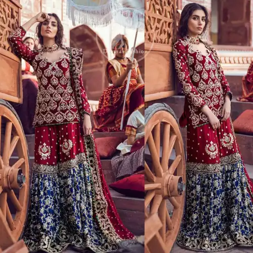 A beautiful short shirt heavily embellished with silver work enhanced with kora, dabka, tilla, sequins and stones. It is artistically