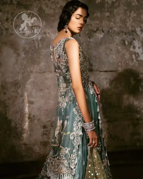 Delicately crafted and personifying chic elegance with an element of grandiose. Heavily embellished in the front with intricate embroidered pattern