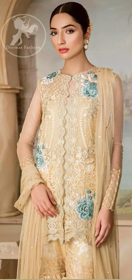 Boost your confidence and style in this glamorous attire accentuated with finest thread work embroidery and cut work hemline. This open shirt having full length sleeves and decorated with embroidery at the end. It comes with brocade gharara. It is coordinated with tissue dupatta which is sprinkled with sequins all over it.
