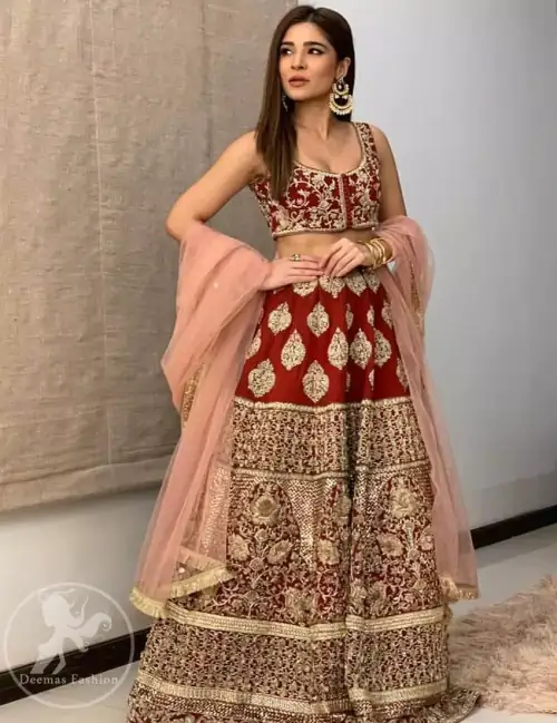 Steal the moment with our sepia brown blouse skirt emphasized with traditional embroidery and intricate floral embellishment enhanced with gold