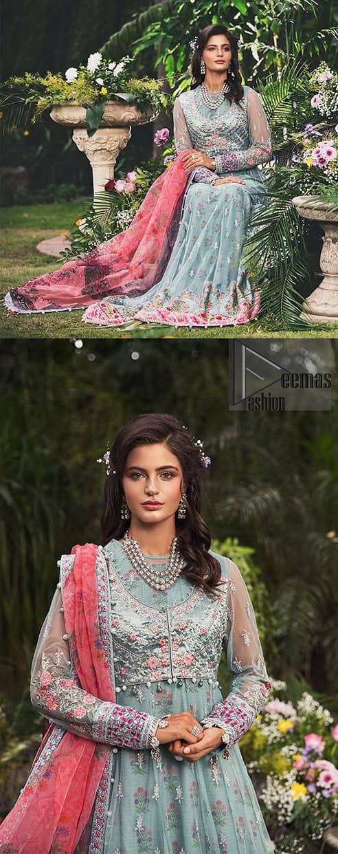 Gussy up in this luxuriously designed pishwas emboldened with intricate embroidery along with beautiful rich patterns and delicate details at the daaman. The front open jacket executing heavily hand crafted art of zardosi, kora and dabka with splashes of silver and pink floral motifs is a classical visit to feminine personification. Having full length sleeves adorned with floral bootis and lace details. It comprises with matching churidar pajama. Style it with self printed net dupatta having four sided thin border and dangling balls on all four sides.