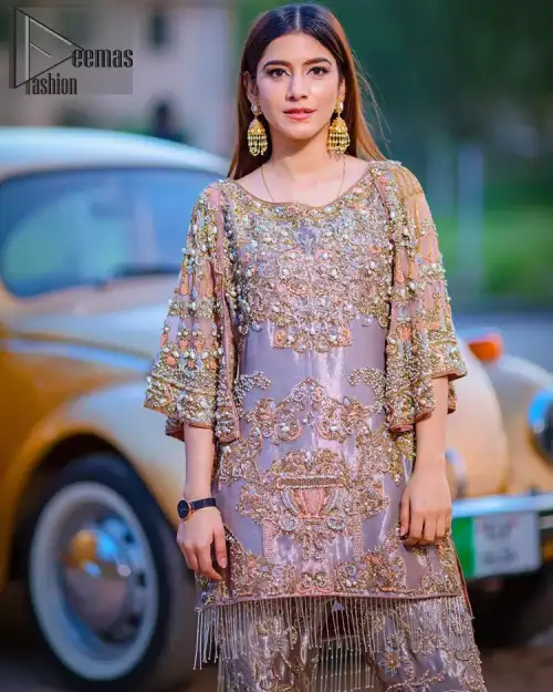 Tradition meets modernity. This outfit is stunningly perfect for any evening ensemble. This dress is beautifully sculptured with floral embroidery,