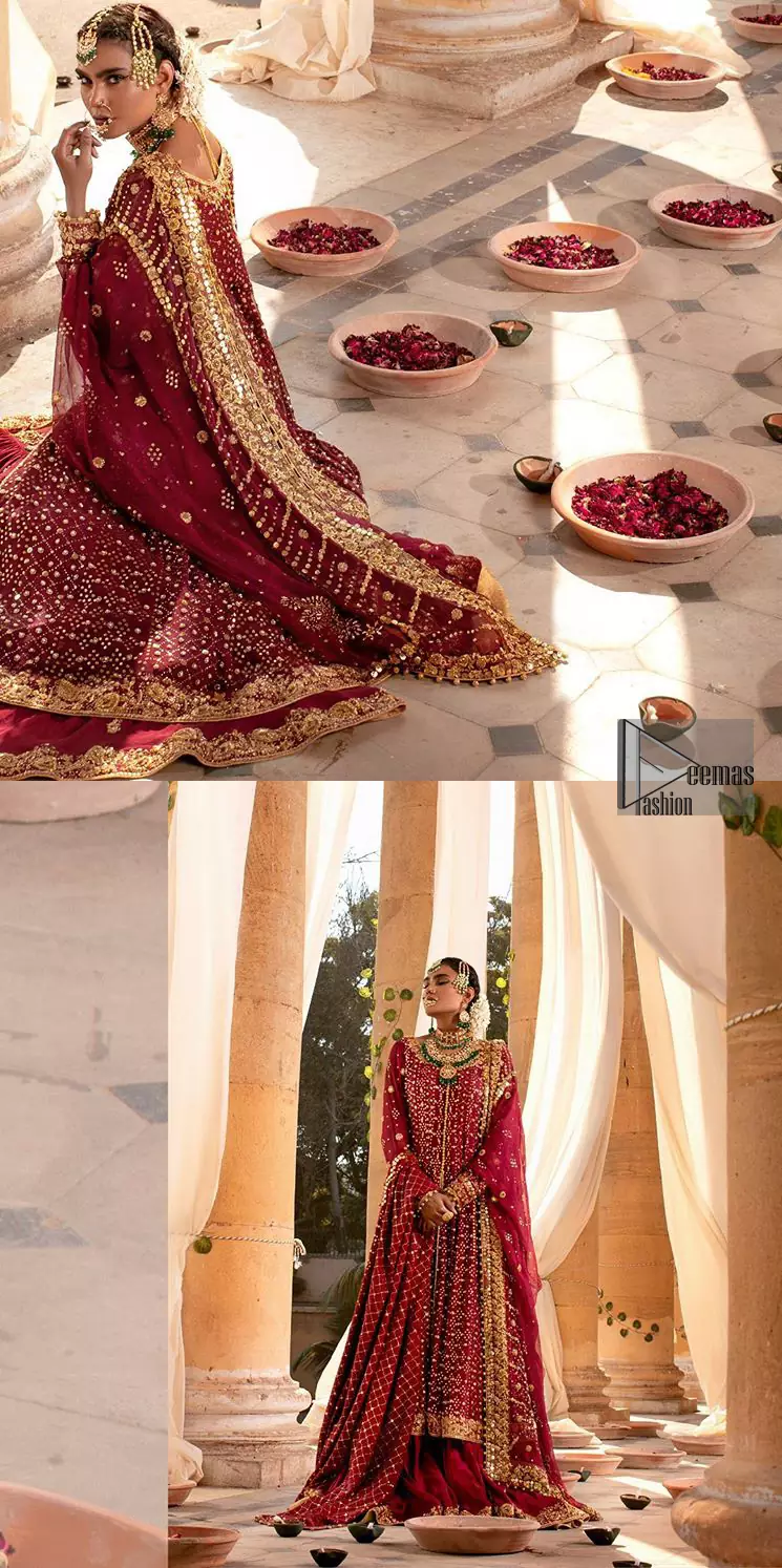 A must have creation for your wedding day. This traditional front open style bridal is aesthetically designed with sequins beads details, embellished with kora, dabka, nakshi and sequins. The daaman is emphasized with intricate zardosi details that gives perfect ending to this pishwas. Style it up with artfully coordinated maroon sharara finessed with golden zardosi details at the bottom. The dupatta incorporates beautifully designed borders on all four sides, focusing on the criss cross pattern to give it a perfect look.