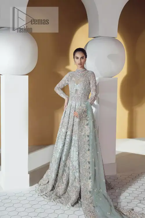 The frock is perfected with delicate golden and silver embroidery. Furthermore this shirt is made of rich floral embroidery which