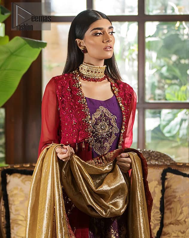 Tradition meets modernity. Boost your confidence and style in this glamorous attire accentuated with finest zardosi work, stunningly perfect for any evening ensemle. Short shirt is ornamented with a large motif in the center done with antique shaded kora, dabka, tilla and sequins. Pair it up with deep red gown beautifully adorned with floral thread embroidery on the bodice and finishing with tassels. Furthermore it is highlighted with floral bootis. Finish the look with brocade sharara. It is comprises with golden brocade dupatta having embellished red applique on all four sides.