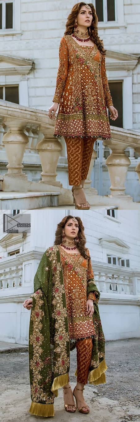 Bring out your beauty with this traditional yet modern outfit for mehndi mayon day. Make your wardrobe more interesting with this shabby chic statement intensified with rich thread embroidery and zardosi work all over the front and geometric patterns at daman that instantly draws attention. It is highlighted with antique shaded kora, dabka, sequins and pearls. Having full length sleeves adorned with floral booties. It comprises with cigarette pants. It is coordinated with beautiful dupatta with thick embellished border on two sides and scattered sequin on the ground to convey a classic look.