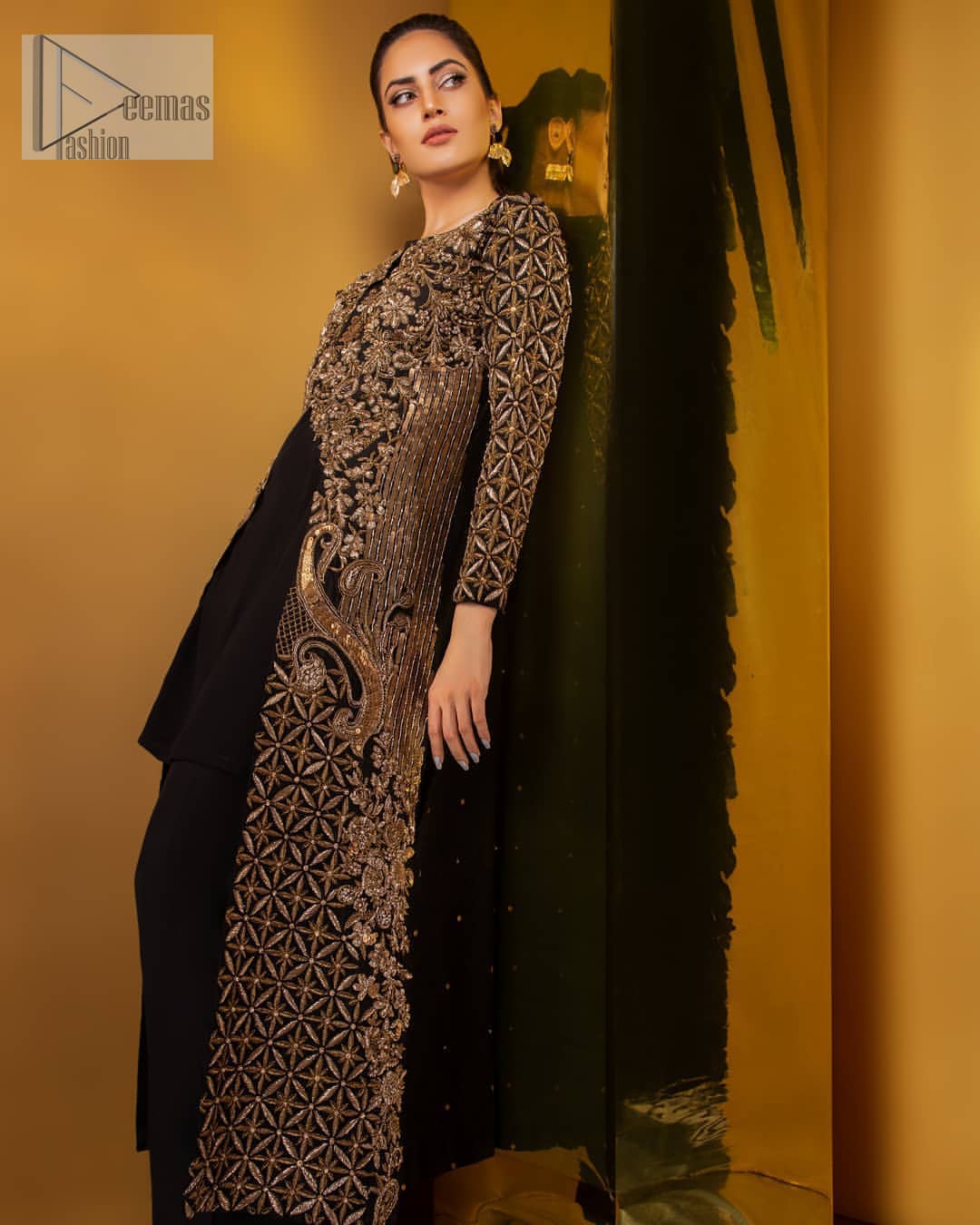 Perfected with antique gold and dark antique embellishments this black velvet ensemble is timeless masterpiece in to a chic fantasy. Delicately crafted with zardosi, kora, dabka, tilla, sequins and pearls. Furthermore it is adorned with geometric patterns all over. Beautifully designed sleeves is an amalgamation of geometric and floral design elements. This outfit is finished with black raw silk palazzo pants and pure chiffon dupatta.