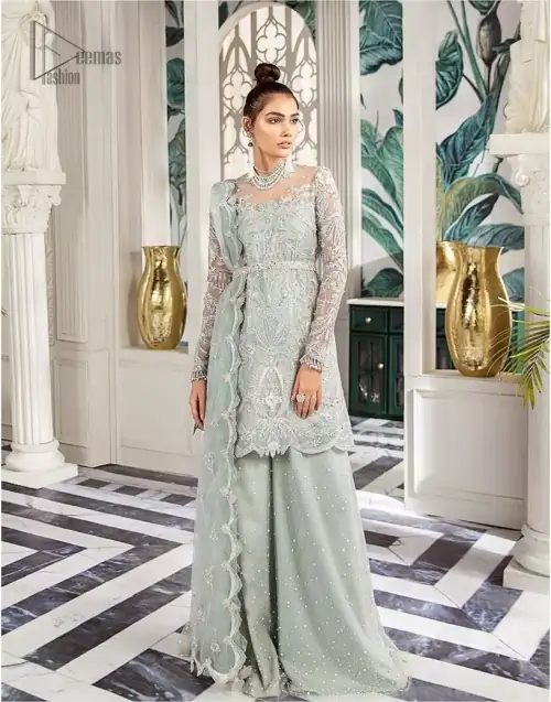 Delicately crafted and personifying chic elegance with an element of grandiose. This outfit is aesthetically designed with motifs and floral