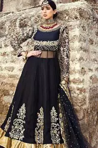 Delicately crafted and personifying chic elegance with an element of grandiose. This regal black outfit is an immensely captivating traditional piece, enhancing the art of classical heritage showcasing the craftsmanship of golden kora, dabka, tilla detailed with sequins and pearls; artistically embellished to give a beautiful rhythm to the outfit. Furthermore the anarkali frock is enhanced with fascinating embellishment on neckline and frilled hemline. It comes with an exquisite black lehenga with thick embroidered bottom to give it a regal look. It comes with a black net dupatta with sequins sprayed all over finished with thick embellishment all around the edges.
