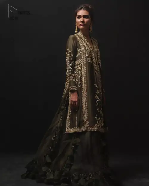 Discover your inner charm with this ravishing front open shirt adorned with golden embellishment. A delicate arrangement of hand embellished