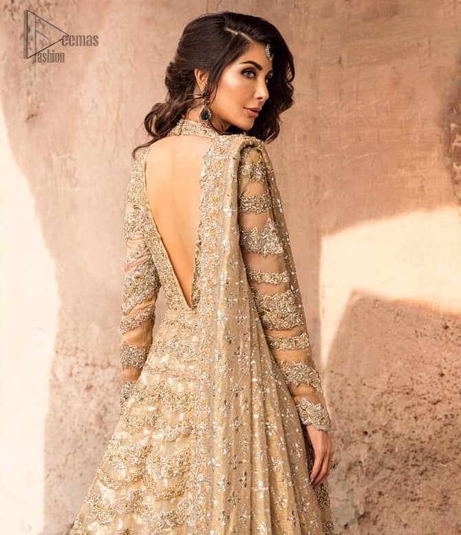 This artisanal piece is rendered in grace and timelessness. The floor length maxi highlights the collision of heritage and beauty of traditional zardozi work and craftsmanship with modern chic silhouette. The bodice with plunging V-neckline is adorned in richly zardozi work with fabulous sparkle. It boasts a pretty scallop hemline. The lehnga is done with thick kora and dabka borders to completes the look. This outfit is comprises with chiffon dupatta sprinkled with sequins on the ground and and four sided border.