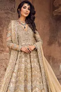 This artisanal piece is rendered in grace and timelessness. The floor length maxi highlights the collision of heritage and beauty of traditional zardozi work and craftsmanship with modern chic silhouette. The bodice with plunging V-neckline is adorned in richly zardozi work with fabulous sparkle. It boasts a pretty scallop hemline. The lehnga is done with thick kora and dabka borders to completes the look. This outfit is comprises with chiffon dupatta sprinkled with sequins on the ground and and four sided border.
