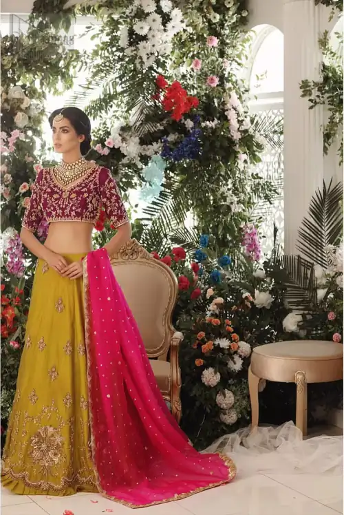 Adorn yourself with this breath-taking mehndi lehenga outfit. This beautiful mehndi dress comes with yellow lehenga with scattered beautiful embellished