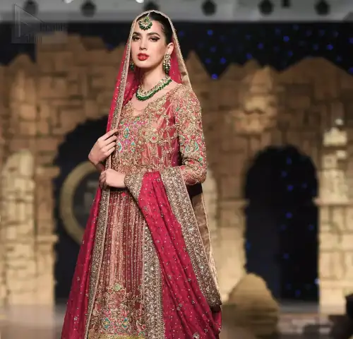 Nothing speaks of femininity and class louder than this outfit. This beautiful dress comes with burgundy A-Line frock with beautiful