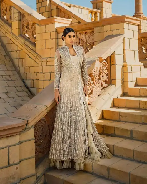 A fusion of traditional and latest fashion making the outfit trendy and unique. This angrakha style floor length maxi is