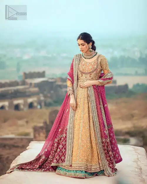 This exceptionally detailed anarkali frock is cut in a seductive fit and flare silhouette that’s sure to turn heads. The