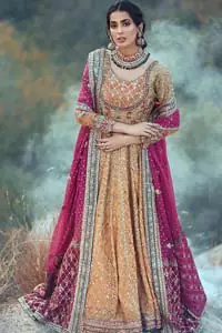 This exceptionally detailed anarkali frock is cut in a seductive fit and flare silhouette that’s sure to turn heads. The bodice with round neckline is adorned in richly beaded work with fabulous sparkle and zardozi work. Furthermore the panels of the shirt is vertically adorned with golden kora, dabka, tilla work and various flora motifs meticulously using on the ground. The frock is comprises with ferozi lehenga emphasized with criss cross patterns done with golden embellishment. Elegance is personified when it gets paired up with an embroidered dupatta with alternating motifs and sequins detailing.