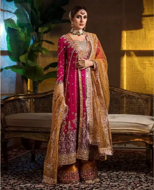 Impeccably on trend. The chic yet elegant front open angrakha style frock is decorated with vertical embroidered lines, embellished neckline