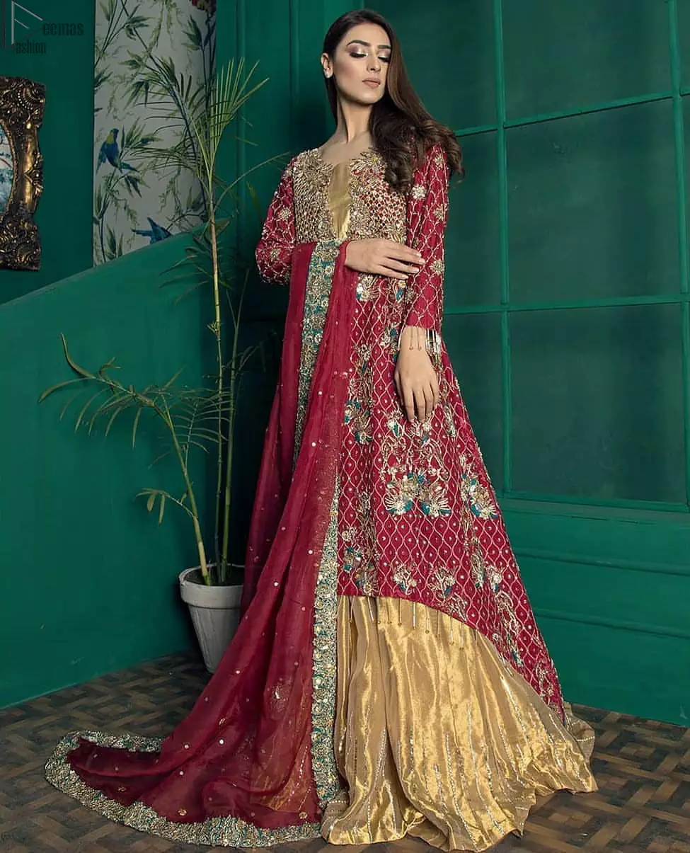 Artistically embellished to give a beautiful rhythm to the outfit. Captured in traditional silhouette, this Maxi and lehenga bursts of vibrant colours and sumptuous details of zardozi.