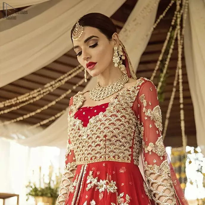 Pakistani Bridal Wear - Red Front Open Back Train Maxi. The outfit is coordinated with an organza dupatta with hand-embroidered borders on all four sides and gota sequin work on the ground.