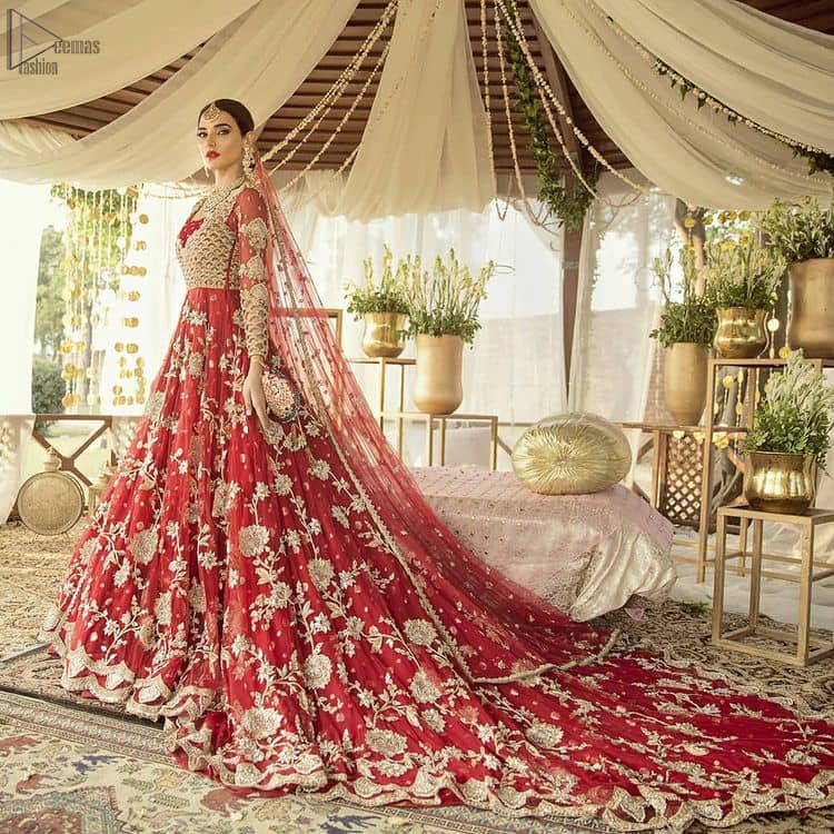 Pakistani Bridal Wear - Red Front Open Back Train Maxi. Complete the look with an artfully coordinated maxi which is ornamented with a bold and captivating back trail design with a traditional intricately embroidered.