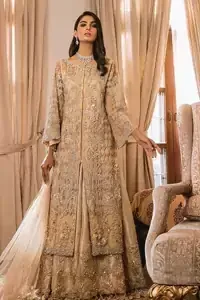An unforgettable look and ideal for the festive season. An elegant yet trendy front open style makes this outfit more classy. Crafted artfully with detailed zardozi work and illusion neckline finessed with kora, dabka, and Kundan. The motifs and intricate details are a true example of decorative and ornamental expression stylized in a contemporary way. The bell sleeves make this outfit more classy. Balance the look with banarsi lehenga highlighted with embroidered borders at the bottom. The dupatta is enhanced with embroidered pallu.