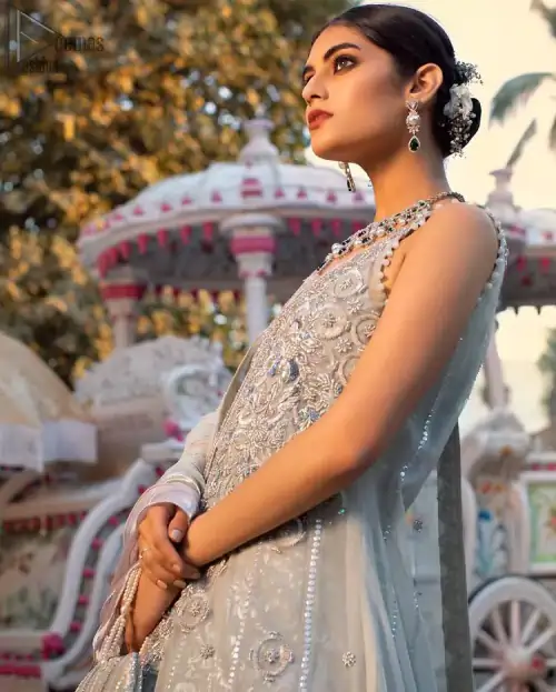 Light gray pure banarsi jamawar blouse, lehenga with front open long jacket having multiple layered frill.