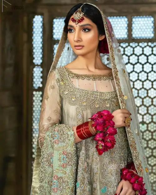 Pastel Green Double Layer Frock - Tea Rose Sharara. Fabulously stitched, Pastel Green double flared frock in maxi style is