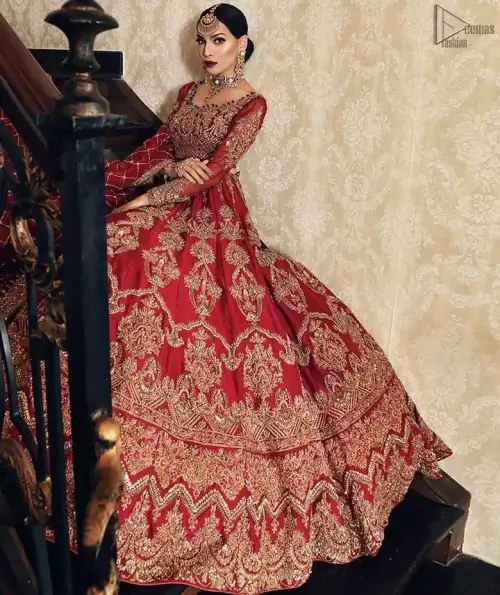 Poise, Beauty, and Charm. Feel pampered in this finely handcrafted celestial-inspired ensemble, deftly ornamented with intricate hand-embroidery. Fitted red blouse