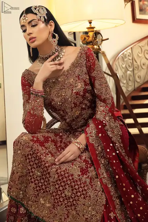 Maroon bridal wear long shirt, appliqued Gharara and matching heavily embroidered dupatta. We will make you believe in fairy-tales! Ethereal